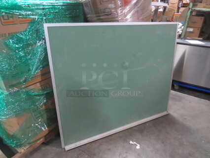 One 60X48 Metal Framed Chalkboard.