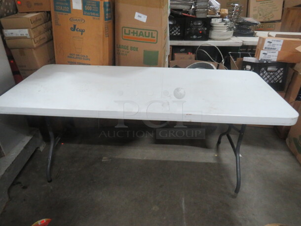 One 96X30X30 Lifetime Folding Table. 