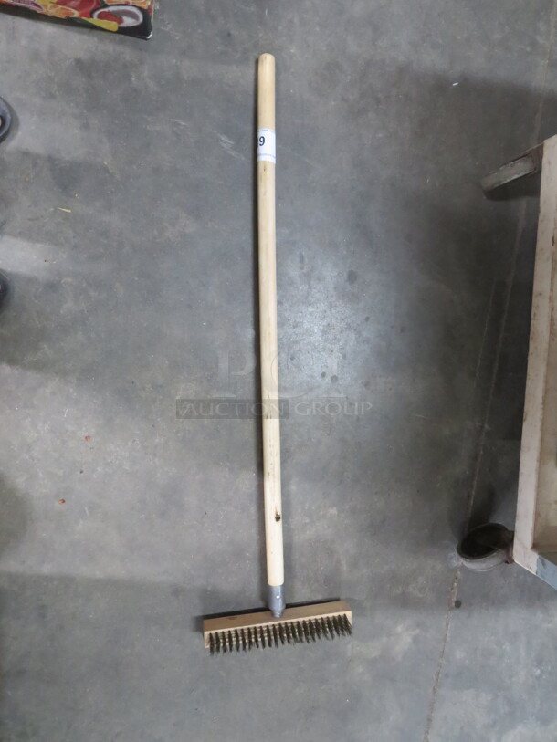 One Wooden Handle Grill Brush.