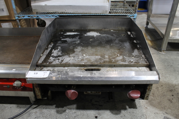 Stainless Steel Commercial Countertop Natural Gas Powered Flat Top Griddle.  - Image 1 of 6