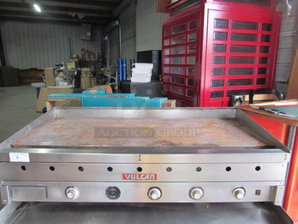 One Vulcan Natural Gas Griddle. Missing 1 Knob. 60X31X19
