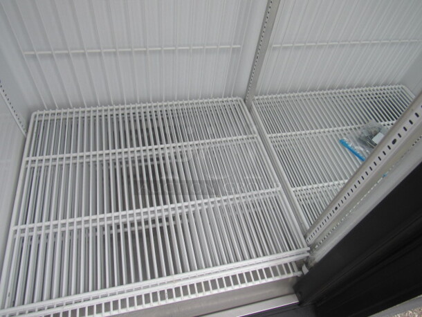 One 2 Door TRUE Freezer With 8 Racks. Model# GDM-49F. 115/208-230 Volt. 1 Phase. 54X30X78.5 Working Not Cold. - Image 2 of 3