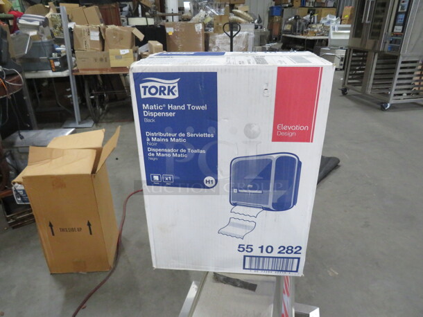 One NEW Tork Paper Towel Dispenser. #55 10 282
