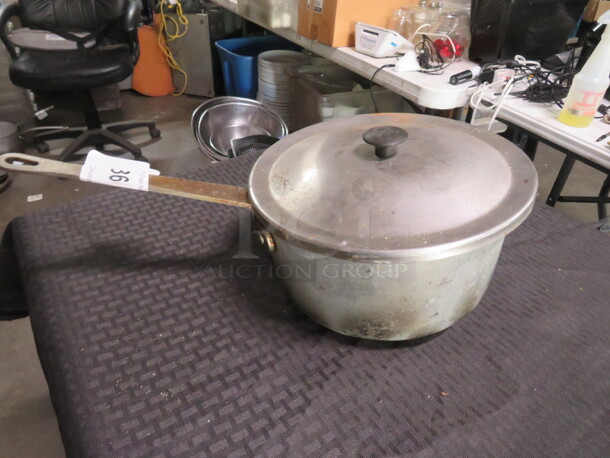 One Aluminum Sauce Pan With  Lid. 9.5X5