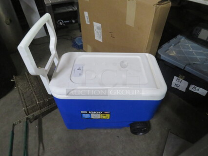 One 38 Quart Igloo Cooler With Wheels.