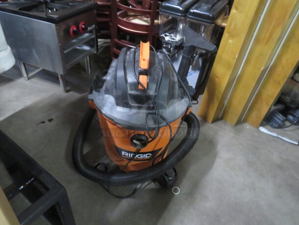 One Ridgid Wet/Dry Shop Vac With Attachments. #HD12000. 120 Volt. 5.0php.