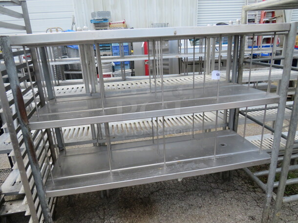 One Stainless Steel Shelving System With 3 Shelves. 61.5X24X58
