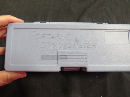 One NEW Portable Refractometer.