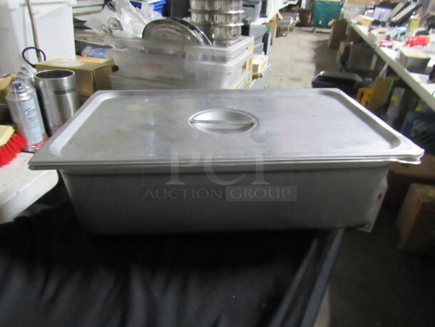 One Full Size 4 Inch Deep Hotel Pan With Lid.  - Image 1 of 1