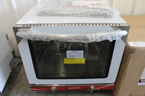 BRAND NEW SCRATCH AND DENT! Avantco 177CO28M Stainless Steel Commercial Countertop Electric Powered Half Size Convection Oven. 208/240 Volts, 1 Phase.