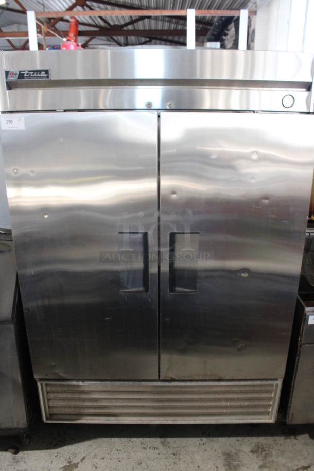 True Model T-49 Stainless Steel Commercial 2 Door Reach In Cooler on Commercial Casters. 115 Volts, 1 Phase. 54x30x83. Tested and Powers On But Does Not Get Cold