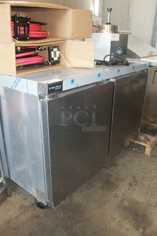 LIKE NEW! 2022 Delfield GUR48P-S Stainless Steel Commercial Front Breathing 2 Door Undercounter Cooler on Commercial Casters. 115 Volts, 1 Phase. Unit Has Only Been Used a Few Times! Tested and Working!