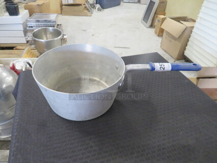 One Aluminum 7 Quart Vollrath Sauce Pan.