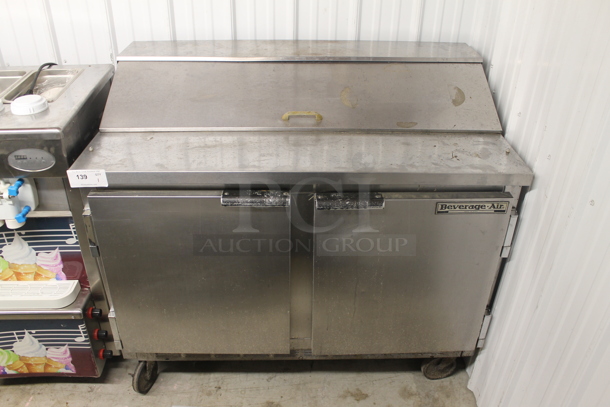 Beverage-Air SP48-12 Commercial Stainless Steel Sandwich/Salad Prep Table With 2 Door Refrigerated Base On Commercial Casters. 115V, 1 Phase. Tested and Powers On But Does Not Get Cold - Image 1 of 7