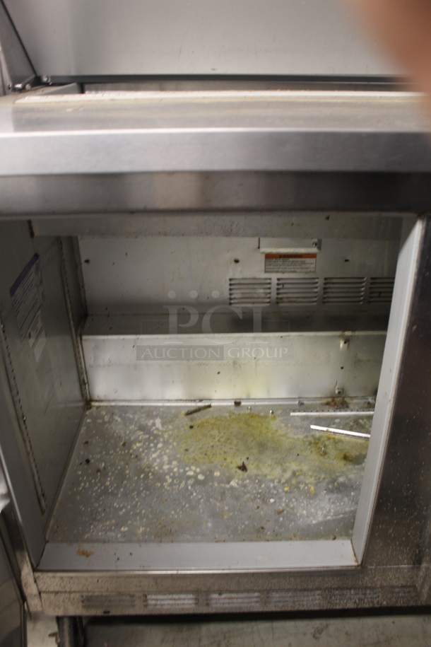 Beverage-Air SP48-12 Commercial Stainless Steel Sandwich/Salad Prep Table With 2 Door Refrigerated Base On Commercial Casters. 115V, 1 Phase. Tested and Powers On But Does Not Get Cold - Image 4 of 7