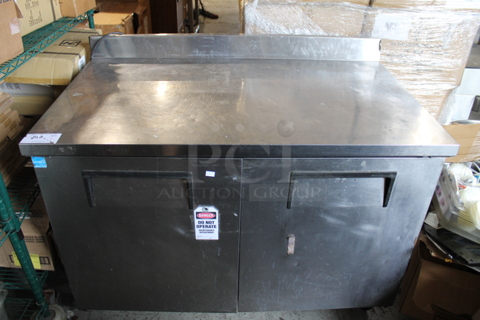 2012 True TWT-48 ENERGY STAR Stainless Steel Commercial 2 Door Work Top Cooler on Commercial Casters. 115 Volts, 1 Phase. Tested and Powers On But Does Not Get Cold