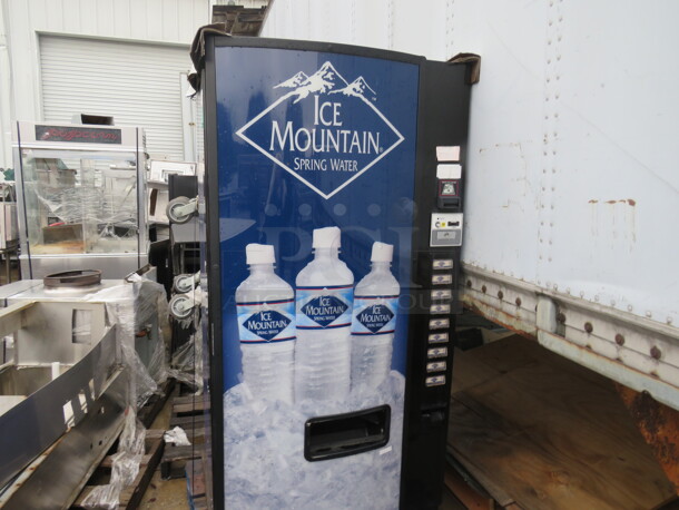One Dixie Narco Soda/Water Vending Machine.  115 Volt. Model# DN-501ER/280-9. No Key. 