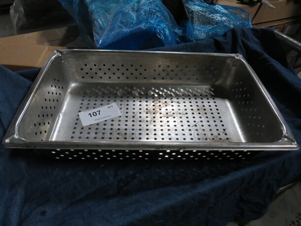 One Full Size 4 Inch Perforated Hotel Pan. 