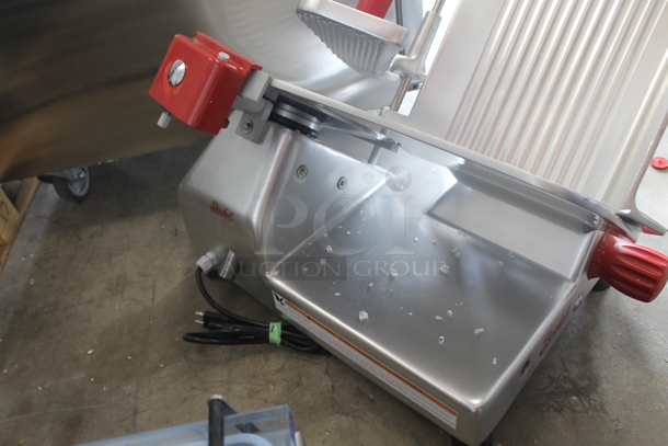 BRAND NEW SCRATCH AND DENT! 2022 Berkel B12-SLC Stainless Steel Commercial Countertop 12" Medium-Duty Gravity Feed Manual Meat Slicer w/ Blade Sharpener. 115 Volts, 1 Phase. Tested and Working! - Image 7 of 9