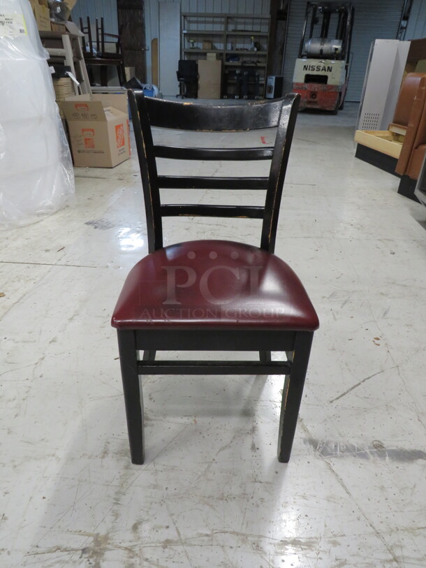 Black Wooden Chair With Red Cushioned Seat. 4XBID