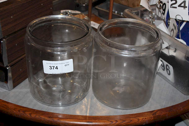 2 Large Mouth Glass Jars.
10x10-1/2
2x Your Bid