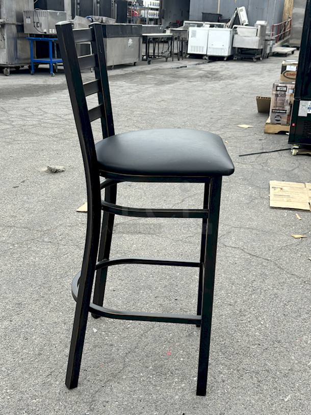 BRAND NEW SCRATCH & DENT! Lancaster Table & Seating (10) Black Finish Cross Back & (1) Distressed Copper Finish Ladder Back Bar Stools with 2 1/2" Navy Vinyl Padded Seat. 11x Your Bid  - Image 12 of 12