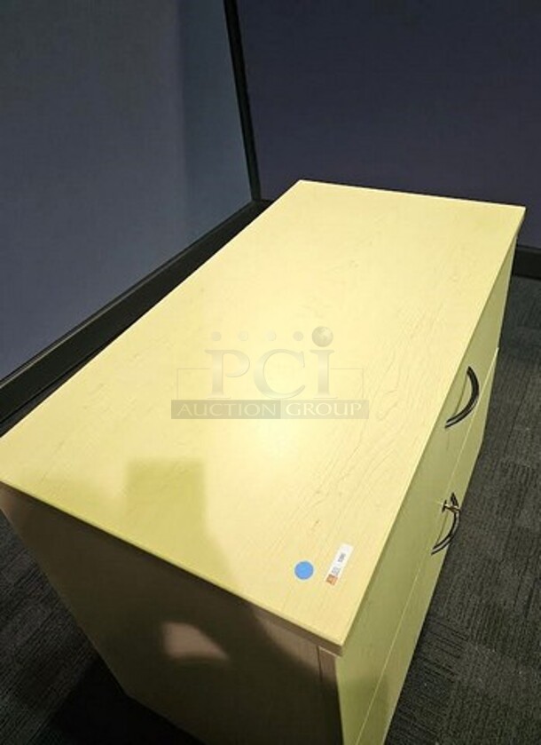 Oak locking lateral file with two drawers and drawer pulls. In like-new condition! 30"H x 36"W x 20"D. 

  - Image 3 of 3