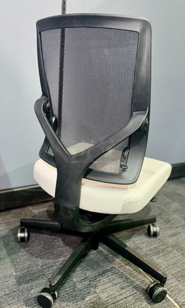 Adjustable AllSteel brand office chairs. No tears or rips, in good used condition! Off-white upholstered seat with a black mesh back and a black metal frame on wheels. Perfect for training rooms, large offices or anywhere that a larger number of matching seating would be preferred. Measure 38.5” H x 19” W.  BIDX10 - Image 2 of 3