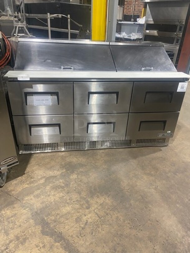 FAB! LIKE NEW! LATE MODEL! 2022 True Commercial Refrigerated Sandwich Prep Table! With 6 Drawer Storage Space Underneath! With Commerical Cutting Board! All Stainless Steel! Model: TFP7230MD6 SN: 10317522 115V 60HZ 1 Phase! Working When Removed!