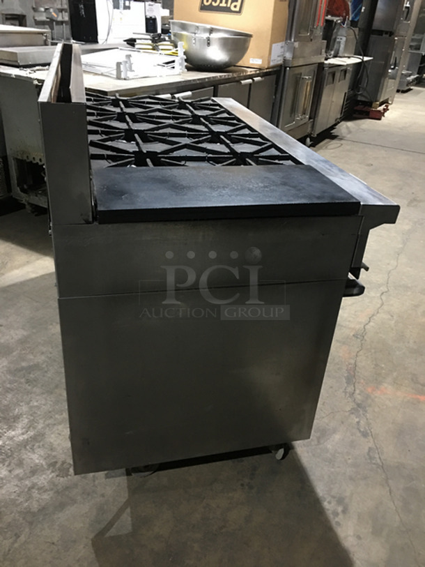 AN ANMAZING FIND! Garland 8 Burner Stove! With Left Side Hot Plate! With Back Splash! With 2 Full Size Ovens Underneath! With Metal Oven Racks! All Stainless Steel! On Casters! - Image 4 of 10