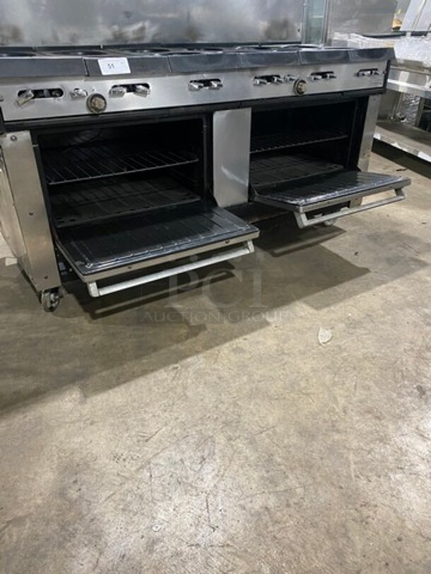 AMAZING FIND! Garland Natural Gas Powered 12 Burner Stove! With 2 Full-Sized Ovens! With Metal Oven Racks! With Raised Back Splash & Salamander Shelf! Stainless Steel! On Casters! - Image 6 of 9