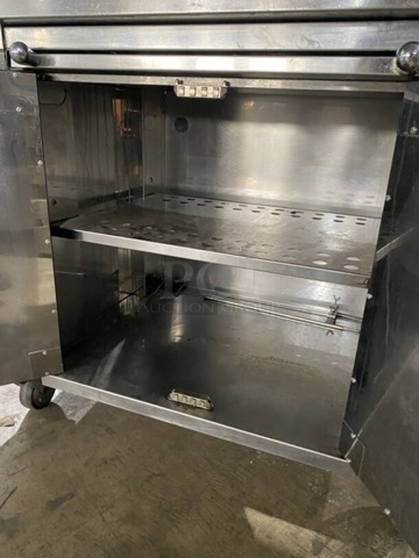 Nice! ROTISOL Heavy Duty Natural Gas Fired Chicken Rotisserie Machine! With Skewers! Model 975.5 Serial 7949! 220-240V/60Hz/1 Phase! On Commercial Casters! 
 - Image 9 of 10