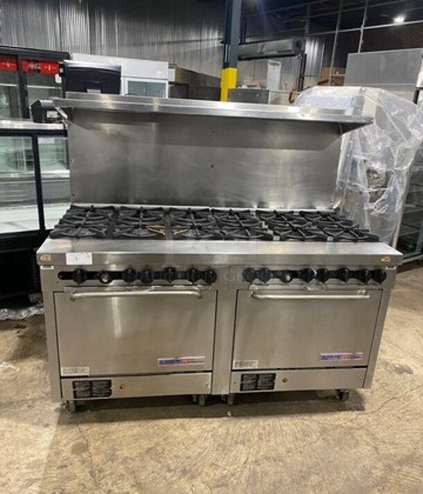 Southbend Commercial Natural Gas Powered 12 Burner Stove! With Raised Back Splash And Salamander Shelf! With 2 Full Size Oven Underneath! All Stainless Steel! On Casters! Working When Removed!