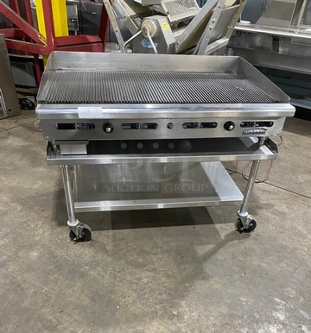 NICE! Imperial Commercial Natural Gas Powered Grooved Grill! With Back And Side Splashes! On Legs! On Equipment Stand! With Storage Space Underneath! All Stainless Steel! On Casters!
