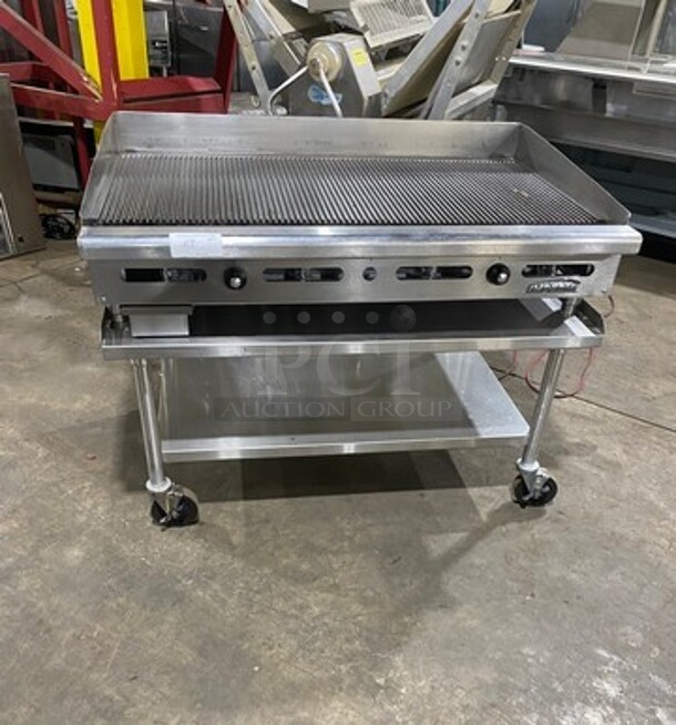 NICE! Imperial Commercial Natural Gas Powered Grooved Grill! With Back And Side Splashes! On Legs! On Equipment Stand! With Storage Space Underneath! All Stainless Steel! On Casters! - Image 1 of 9