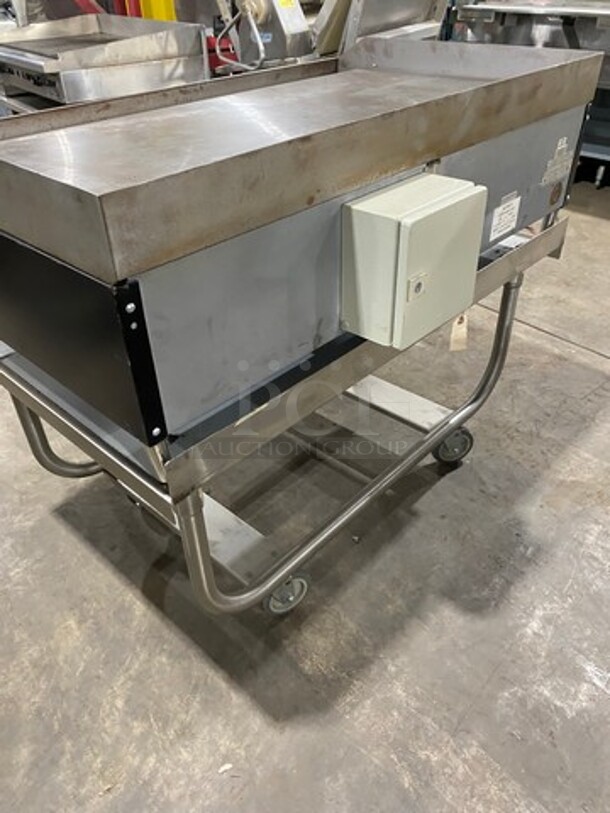 WOW! NEW! NEVER USED! Garland Commercial Countertop Electric Powered Flat Top Griddle! With Back And Side Splashes! On Legs! On Equipment Stand! All Stainless Steel! On Casters! Model: E2448G SN: 0404ME0033 208V 60HZ 3 Phase - Image 3 of 9