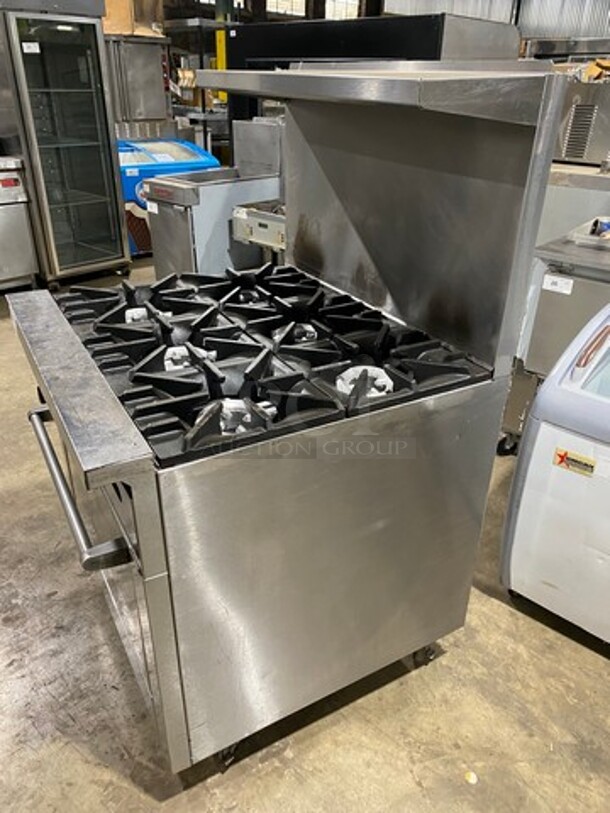 Sunfire Commercial Natural Gas Powered 6 Burner Stove! With Raised Back Splash And Salamander Shelf! With Oven Underneath! All Stainless Steel! On Casters! Working When Removed!  - Image 4 of 10