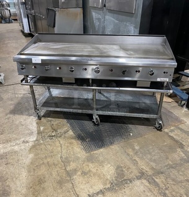 NICE! Garland Heavy Duty Commercial Countertop Gas Powered Flat Griddle! 1-Inch-Thick Plate! With Back And Side Splashes! On Equipment Stand! With Storage Space Underneath! All Stainless Steel! On Casters! WORKING WHEN REMOVED!