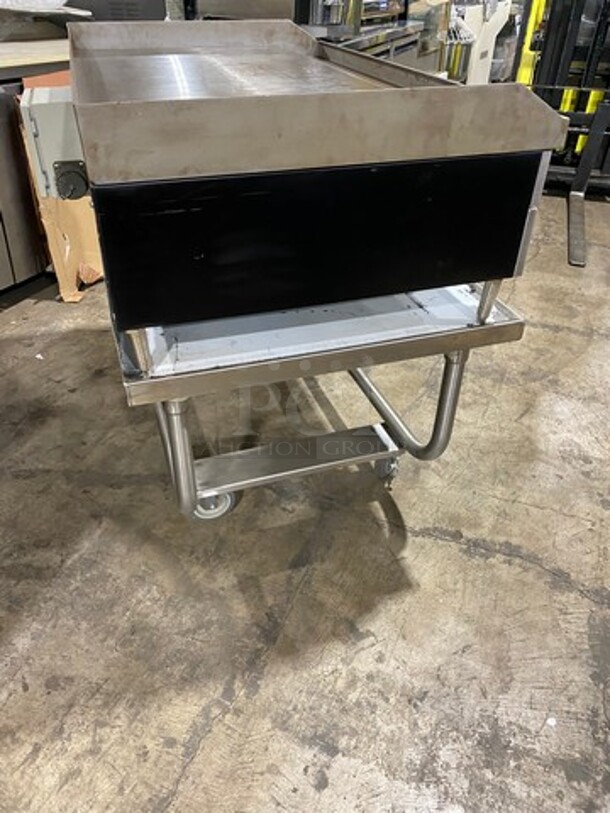 WOW! NEW OUT OF THE BOX! Garland Commercial Countertop Electric Powered Flat Top Griddle! With Back And Side Splashes! On Legs! On Equipment Stand! All Stainless Steel! On Casters! Model: E2448G SN: 0404ME0033 208V 60HZ 3 Phase - Image 3 of 10