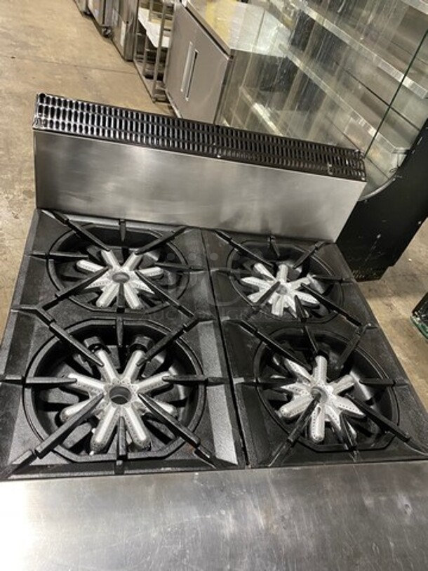 Garland Commercial Natural Gas Powered 4 Burner Stove! With Back Splash! With Oven Underneath! Metal Oven Rack! All Stainless Steel! On Casters! Model: M44R SN: 1601100100589 - Image 5 of 10