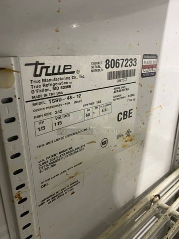 FAB! LATE MODEL! 2014 True Commercial Refrigerated Sandwich Prep Table! With Commercial Cutting Board! With 2 Door Underneath Storage Space! Poly Coated Racks! All Stainless Steel! On Casters! WORKING WHEN REMOVED! Model: TSSU4812 SN: 8067233 115V 60HZ 1 Phase - Image 7 of 10