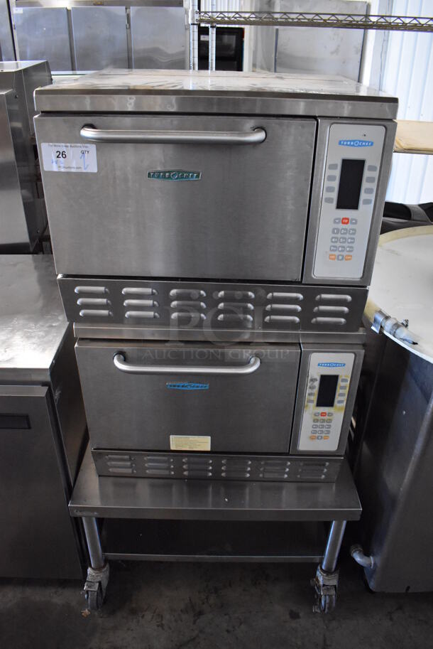 2 Turbochef NGC Stainless Steel Commercial Electric Powered Rapid Cook Ovens w/ Stainless Steel Commercial Equipment Stand on Commercial Casters. 208/240 Volts, 1 Phase. 30x30x55. 2 Times Your Bid!