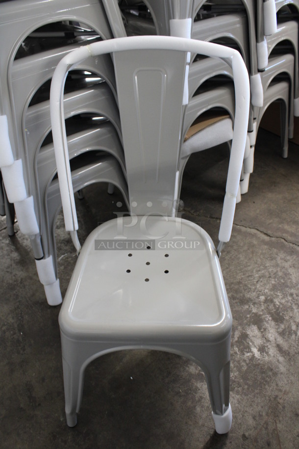 2 BRAND NEW! Silver Metal Tolix Dining Chairs. Stock Picture - Cosmetic Condition May Vary. 17x18x34. 2 Times Your Bid!