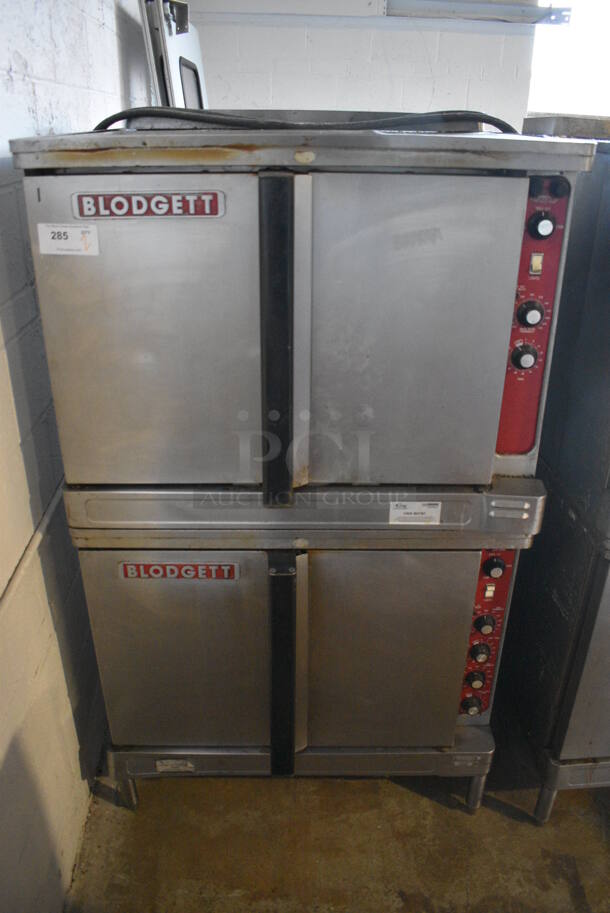 2 Blodgett Stainless Steel Commercial Electric Powered Full Size Convection Ovens w/ Solid Doors, Metal Oven Racks and Thermostatic Controls. 208-220 Volts, 3 Phase. 38x39x65. 2 Times Your Bid!