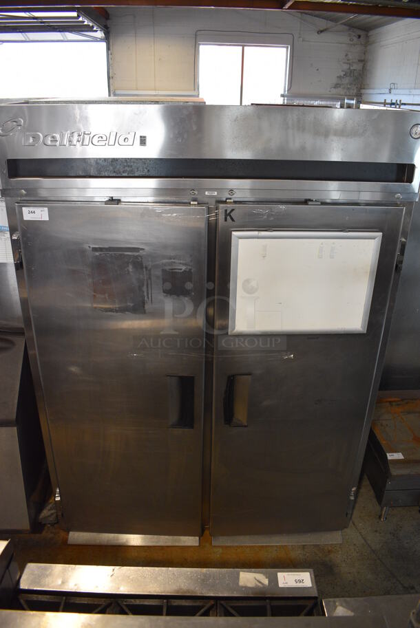 Delfield Model MRRI2-S Stainless Steel Commercial 2 Door Roll In Rack Cooler w/ 2 Ramps. Doors Do Not Stay Closed. 115 Volts, 1 Phase. 66x36x89. Tested and Powers On But Does Not Get Cold