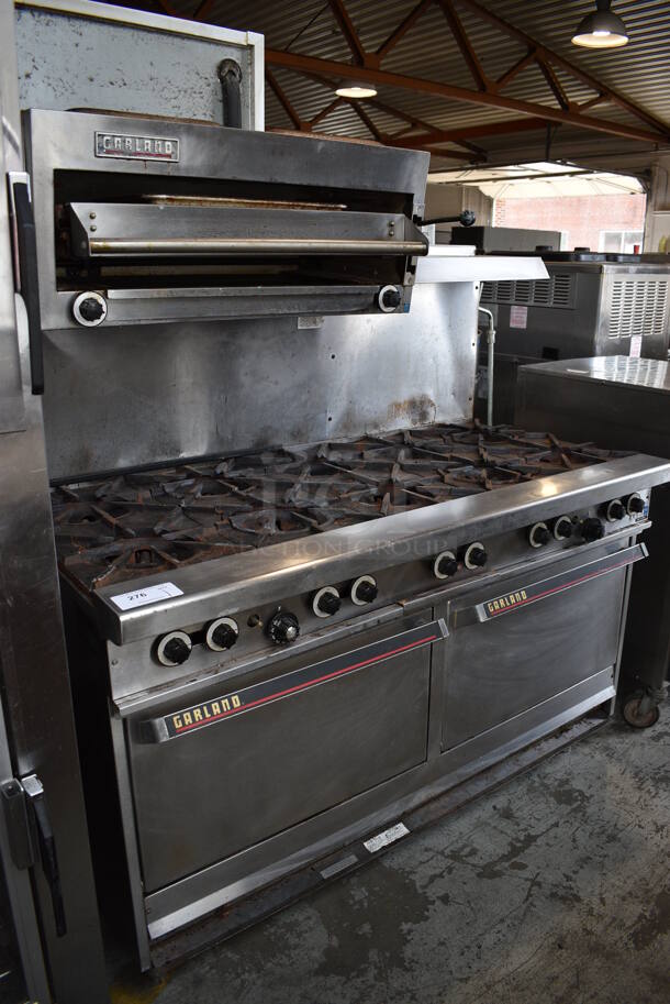 Garland Stainless Steel Commercial Natural Gas Powered 10 Burner Range w/ 2 Ovens, Cheese Melter, Over Shelf and Back Splash. 60x33x68 - Image 1 of 8