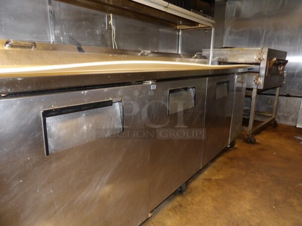 True 3-Door Stainless Pizza/Sandwich Prep Table W/Overhead Shelf. 
TESTED AND WORKING
Model TPP-93
Single Phase - Image 4 of 7