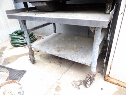 Stainless Steel Low Rise Table.
36"x20"
Location: The cage