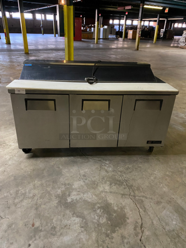 True Commercial Refrigerated 3 Door Sandwich Prep Table! With Commercial Cutting Board! All Stainless Steel! On Casters! Model: TSSU7218 SN: 7857211 115V 60HZ 1 Phase