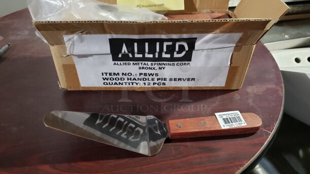 One Lot of Wood Handle Pie Servers - Image 1 of 1
